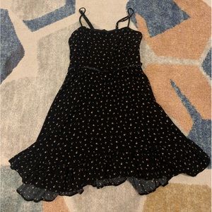 Black floral dress, size small, with a waved flowy skirt